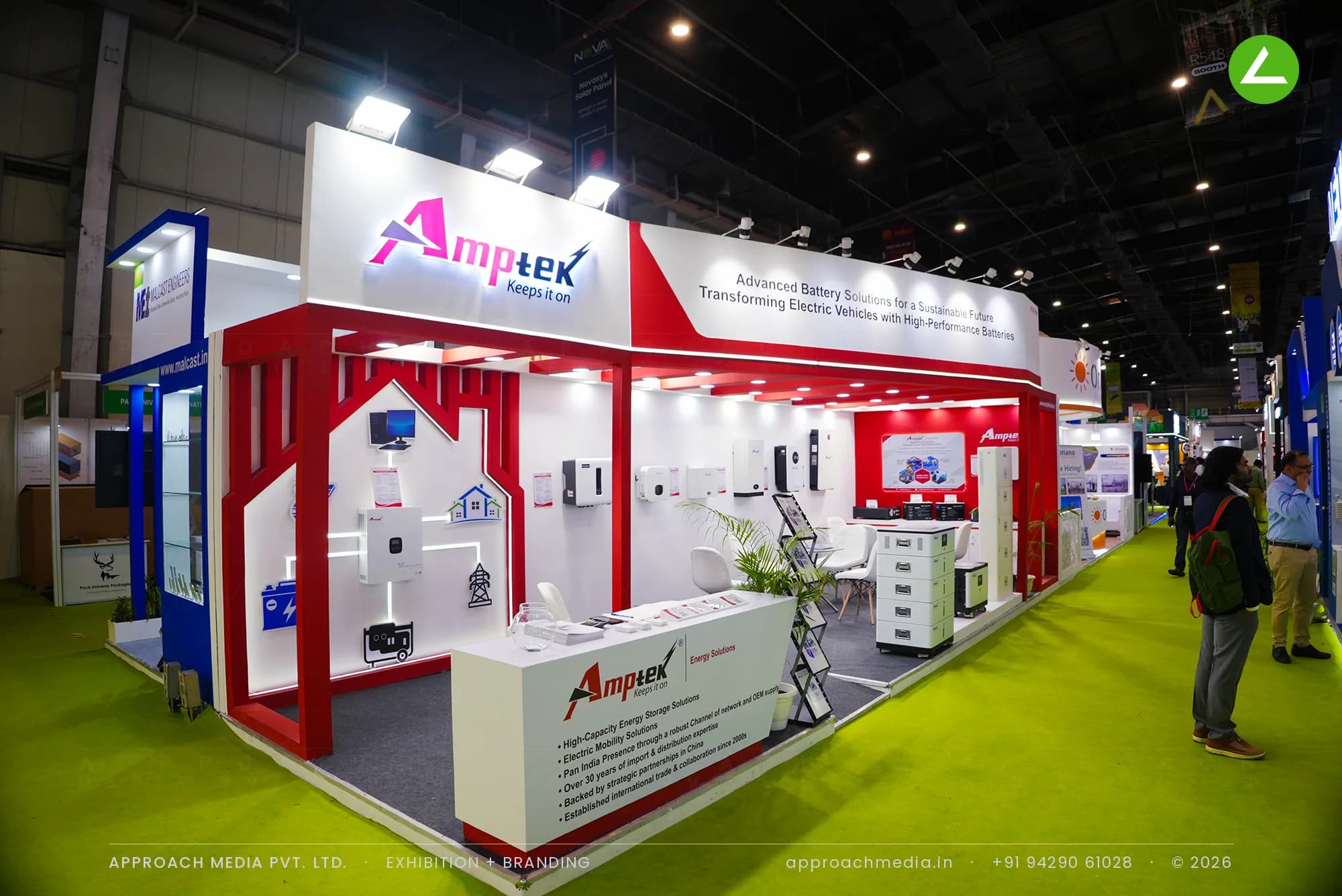 LED circuit-line house graphic and wall-hung inverters at Amptek's exhibition stall design at REI Expo Greater Noida