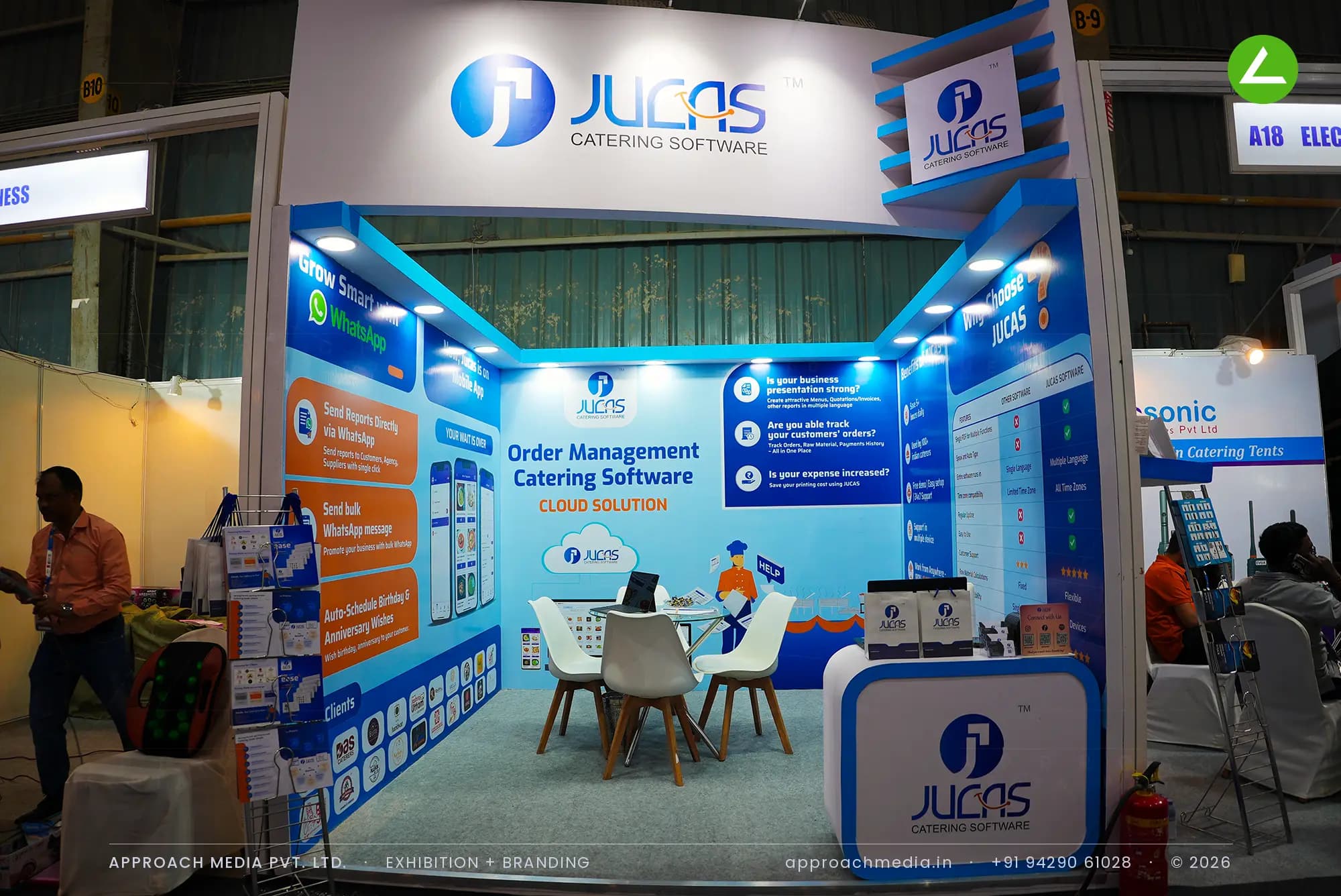 JUCAS exhibition stall design at Catering and Decor Expo Mumbai with printed feature walls and a curved logo header