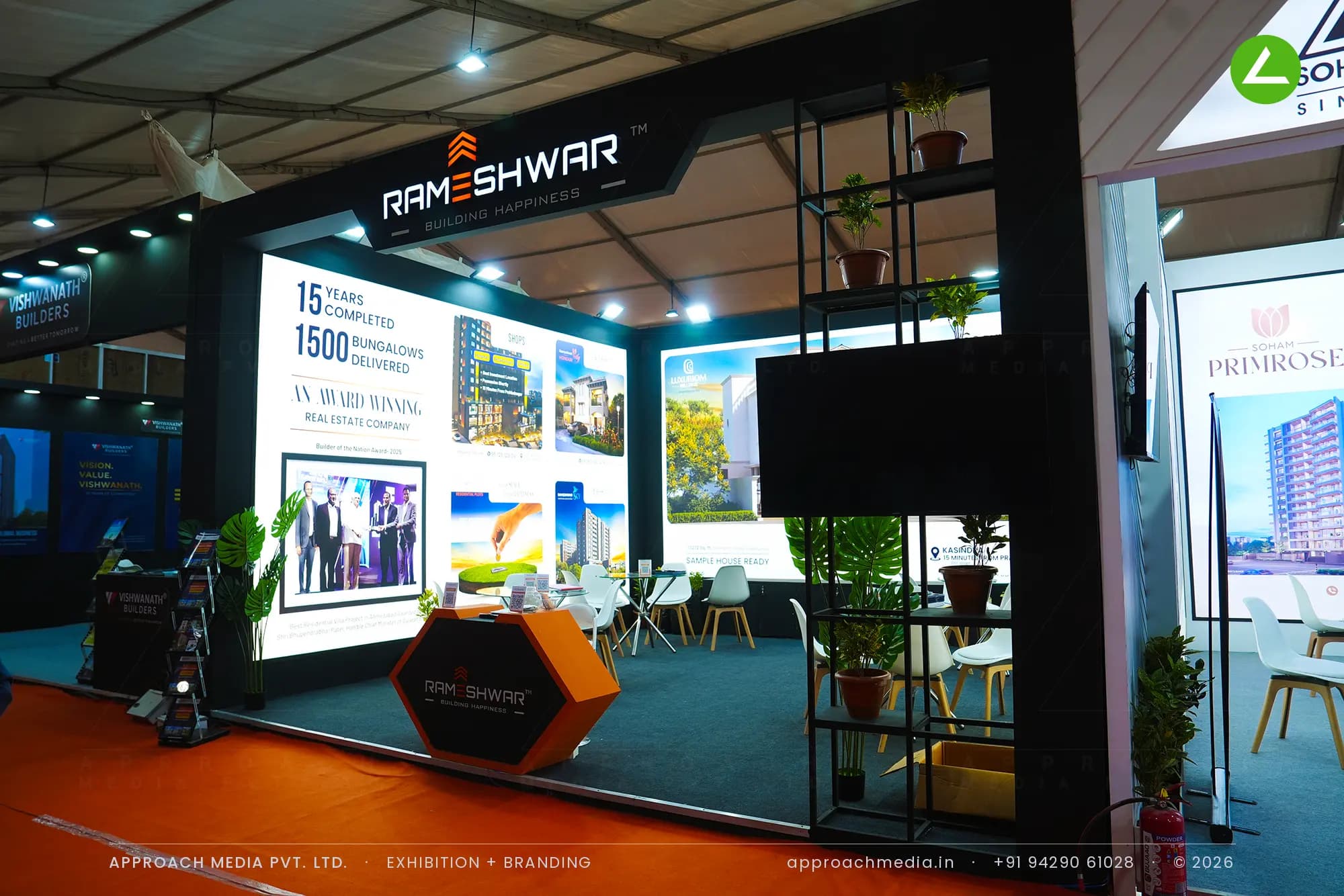 Rameshwar exhibition stall design at NAREDCO Property Expo Ahmedabad with a full-width backlit villa lightbox wall