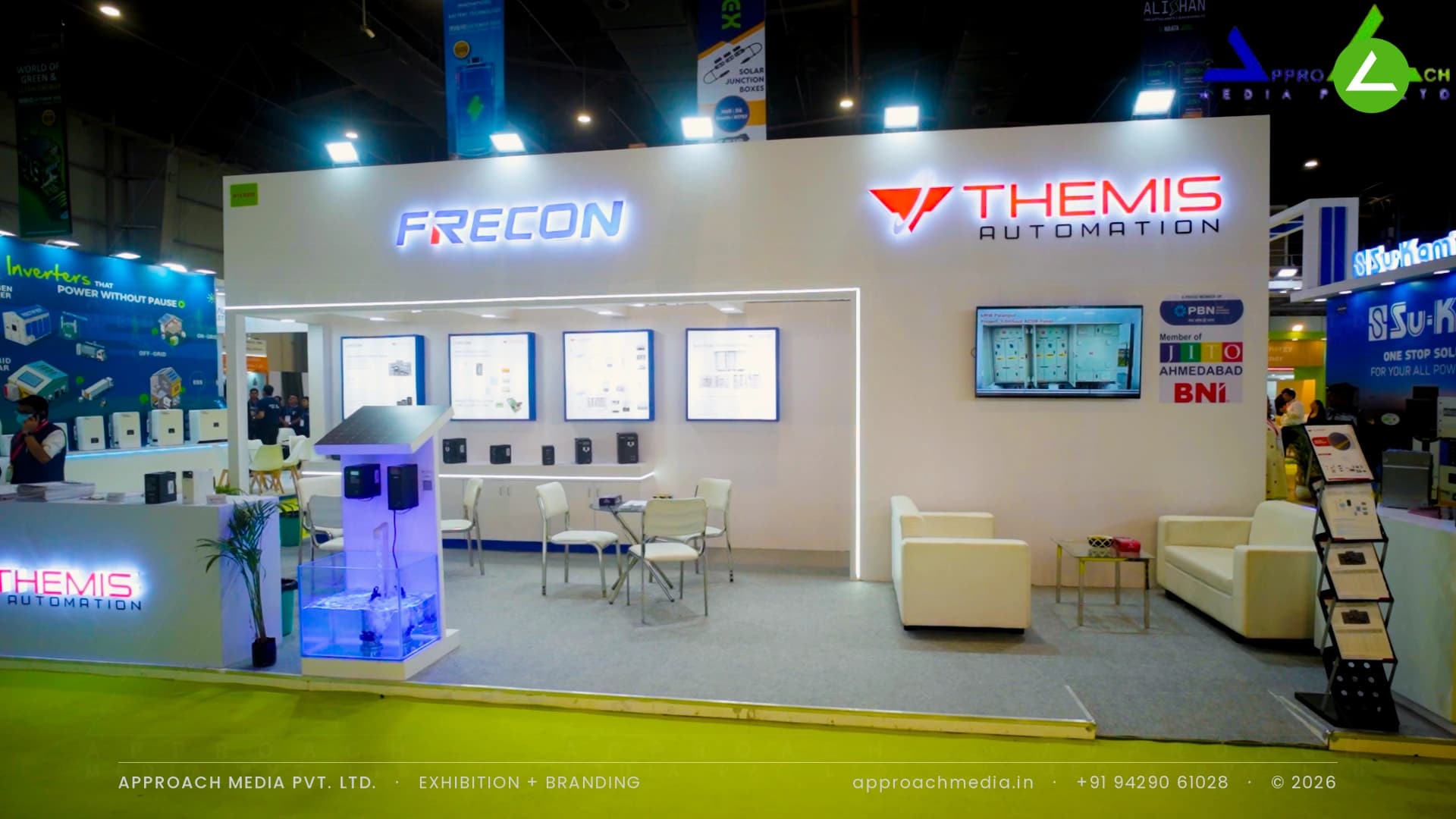 Frecon and Themis exhibition stall design at REI Expo Greater Noida with halo-lit logos and backlit technical panels