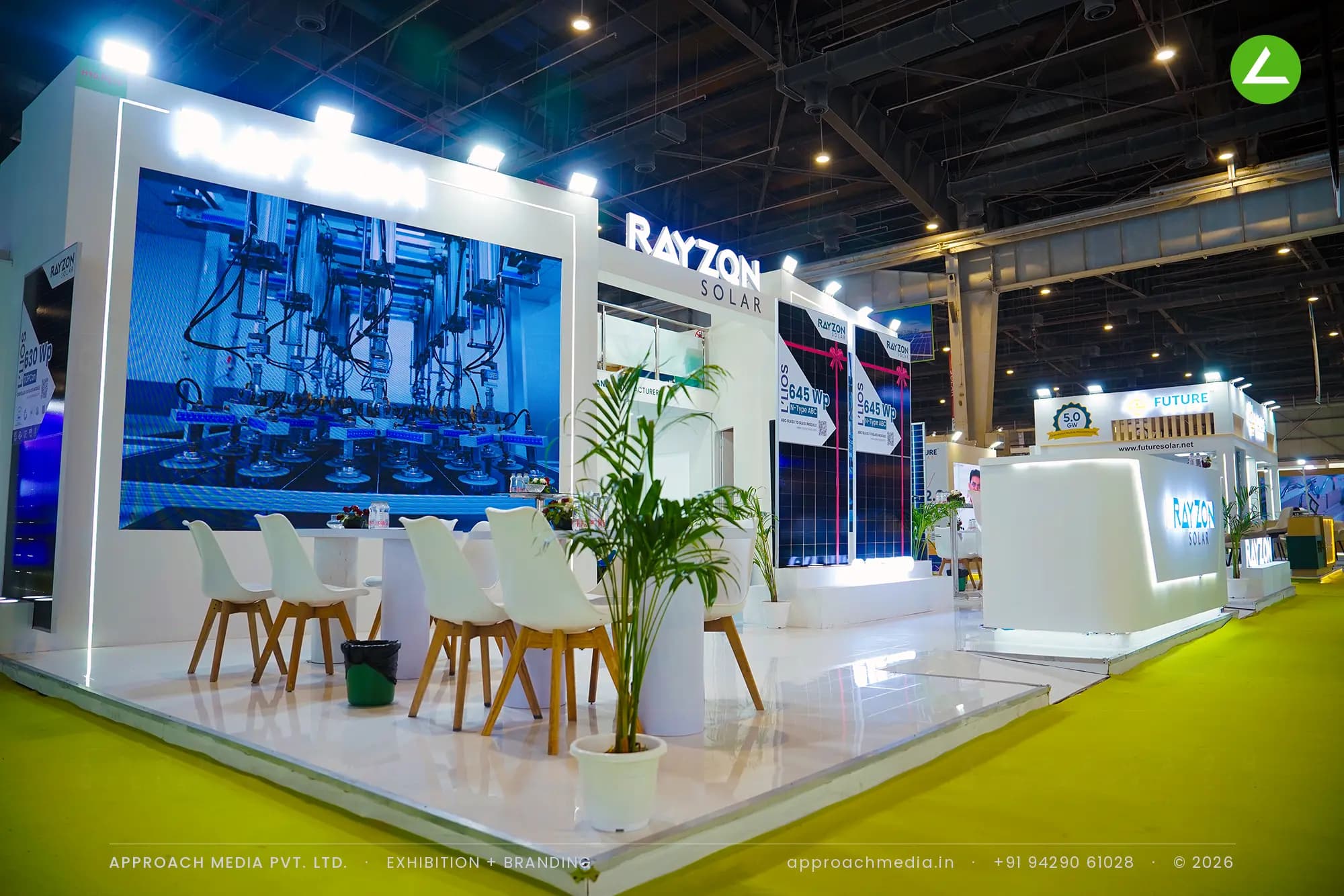 Rayzon Solar double-decker exhibition stall design at REI Expo Greater Noida with LED video wall and gloss white platform