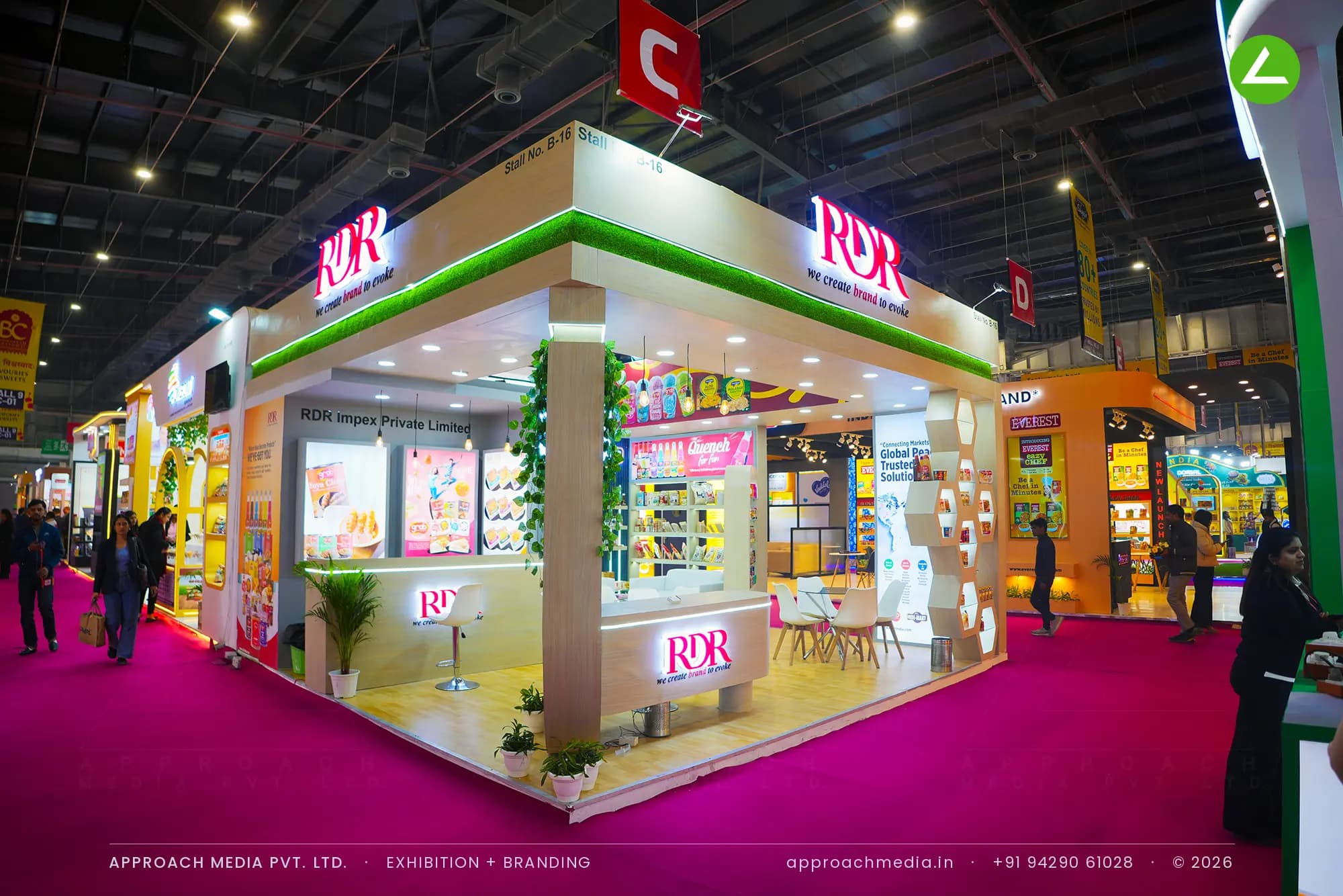 RDR Impex exhibition stall design at Indusfood Greater Noida with lit product shelves and hexagon display module