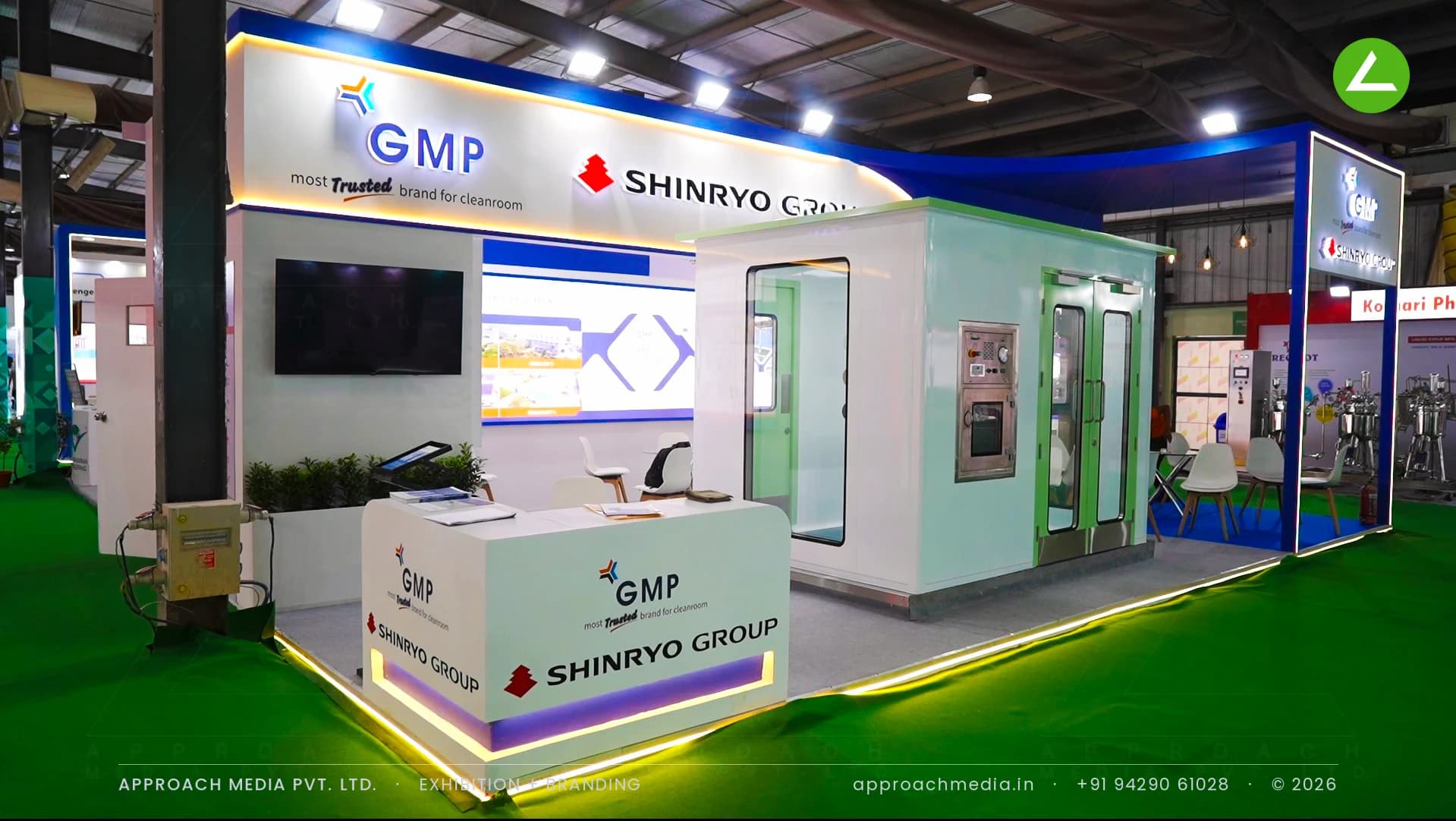 GMP Shinryo exhibition stall design at Pharmatech Expo Gandhinagar, built around a walk-in cleanroom module