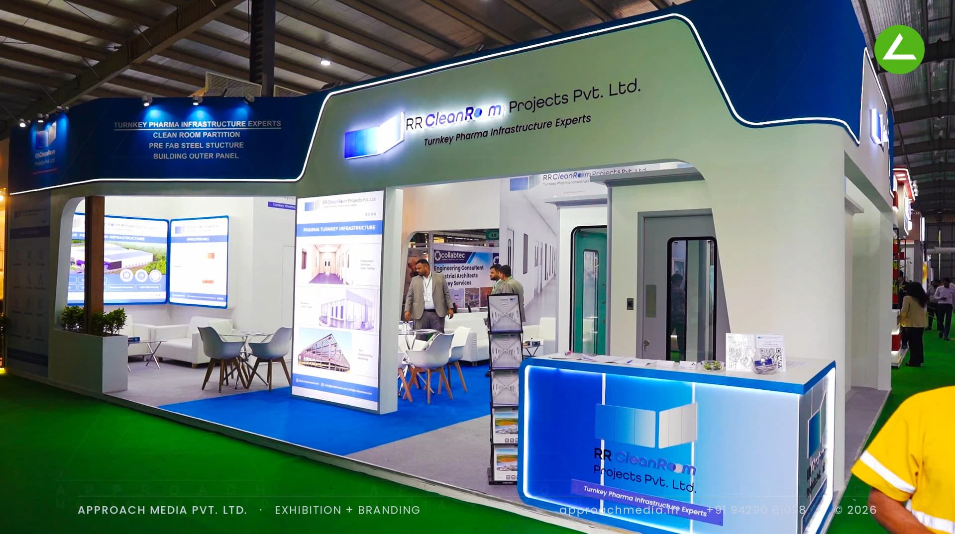 77 sqm three-side-open exhibition stall for RR CleanRoom Projects at PharmaTech Expo 2026, Gandhinagar, with cleanroom partition rooms built on the stand