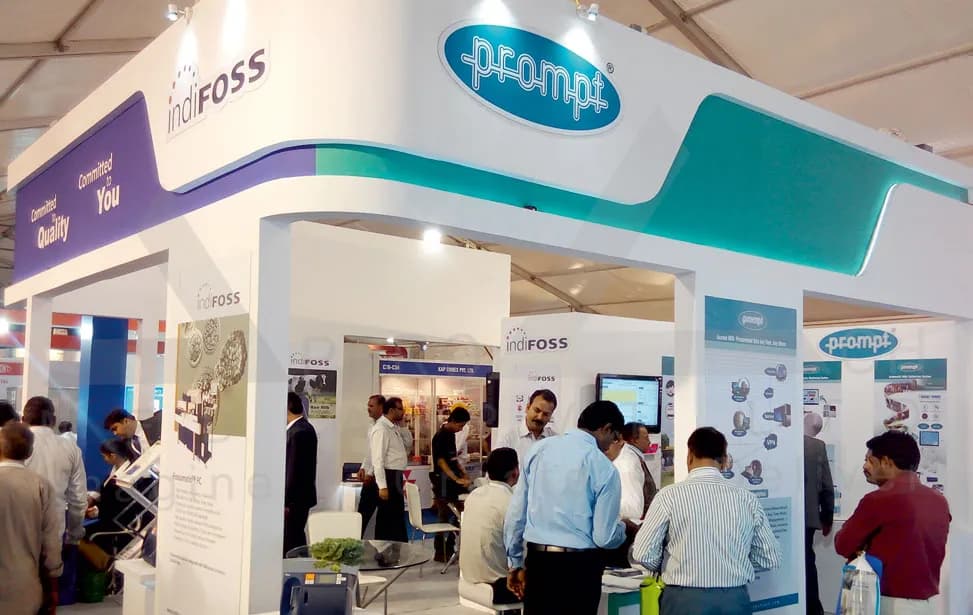 Dairy Testing Exhibition Stall Design at Dairy Expo Hyderabad — 48 sqm 2 side open trade show booth for IndiFoss and Prompt at Dairy Expo