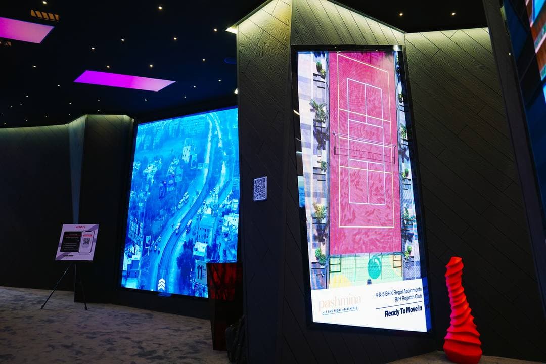 Interactive touchscreen display in an exhibition booth