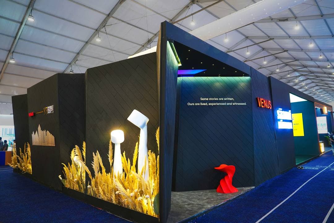 Massive LED video wall spanning the full width of an exhibition stall