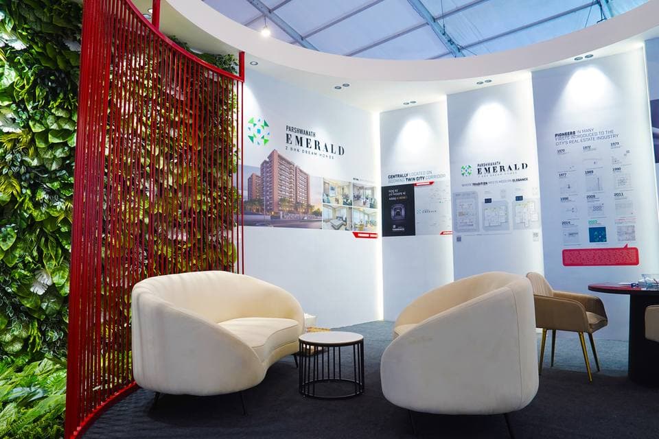 Modern fabricated booth with laminate panels and integrated lighting